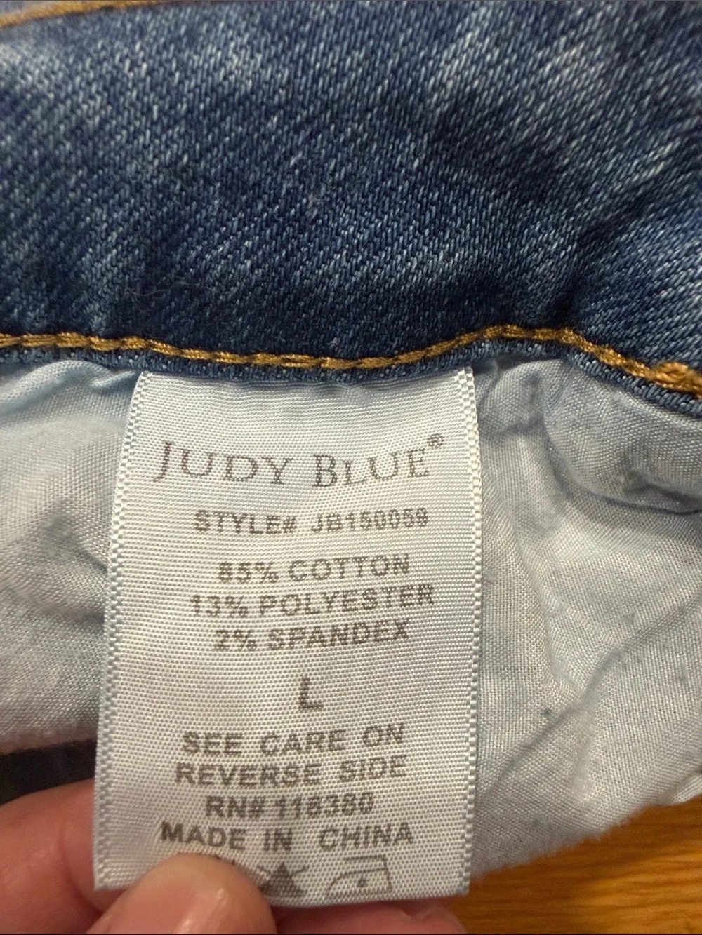 Judy Blue high waisted mild distressed raw hem jeans shorts size large .